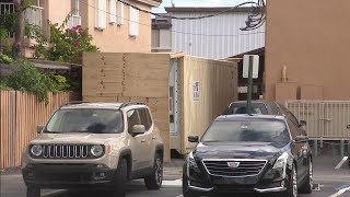 Overwhelmed funeral home brings in refrigerated truck to house COVID-19 bodies