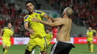 Fight between football player and a football fan in the derby of Tel Aviv
