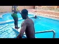 Musa Jakadalla with his team swimming in Mombasa