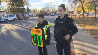 Regina students wear speed radar backpacks to encourage slower speeds in school zones