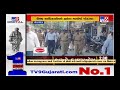 crpf police officials held a flag march in porbandar to spread awareness about law u0026 order tv9news