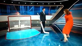 Canadian Jennifer Botterill in High Heels  breaks Sports Nets glass screen while recreating a goal.