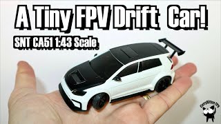 It's a Tiny FPV Drift car!  The SNT CA51 1:43 Scale (you can put regular tyres on it as well)