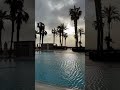 Rise and shine to this great view of the pool & palm trees 🌴☀️ #shorts #sun #sunrise