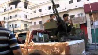 Libya Rebels Close in on Gadhafi, Seize Key Town