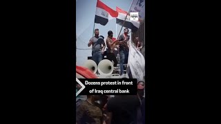 Dozens protest in front of Iraq central bank after US blacklist of Iraqi banks