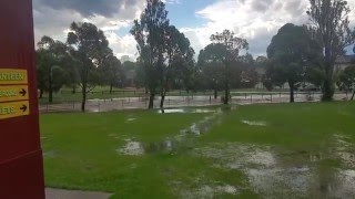 Drainage canal overflow after heavy downpour