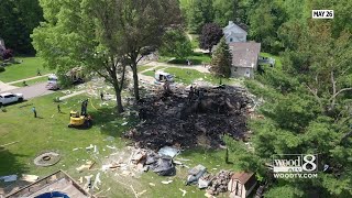 ‘Had to get her out’: Neighbors rescue woman after house explosion