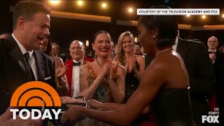 Watch Ayo Edebiri hand Carson Daly her purse during Emmy win