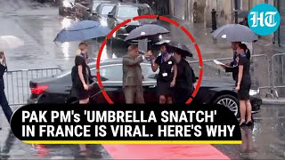 Pak PM 'Pulls' Umbrella From Woman Officer in France; She Is Drenched In Rain | Watch