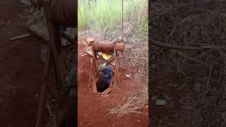 Gemstone Hole - A man digs inside the hole to find gemstone