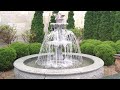 tiered granite fountain with pool surround and spray ring