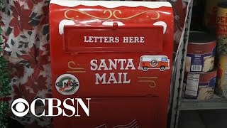 Deli owner becomes local hero for responding to hundreds of "letters to Santa"