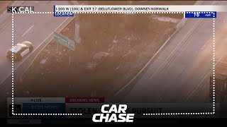 Pursuit suspect veers off freeway and into underpass wash before disappearing