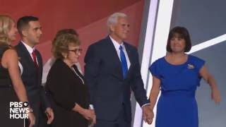 Gov. Mike Pence greets Trump, family on RNC stage