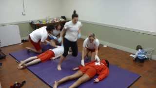 Lifeguarding Drill: Body Roll with Activate EMS and Opening Airway, Prone Victim 2 Rescuers