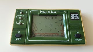 Repairing an 80's style handheld LCD game (Plane & Tank)