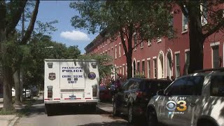 Neighbors Smelled Odor Coming From Building Where Man's Body Found Wrapped In Tarp