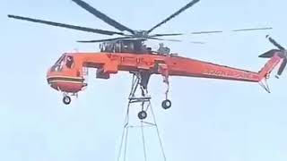 Installing a High Voltage Transmission tower by helicopter