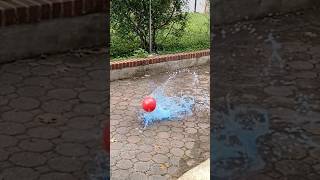 Smashing colored water balloons