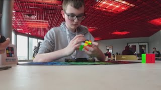 A minute to learn, a lifetime to master | Cubers compete to solve puzzle in fastest time