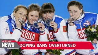 Russian athletes have doping bans overturned