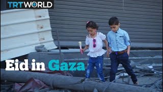 Palestinian kids celebrate Eid al-Fitr amid destruction
