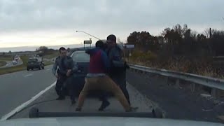 Dashcam video shows moment of near-fatal police shootout