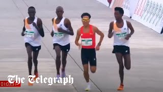 Runners appear to let Chinese contestant win Beijing half-marathon