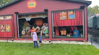 Watching the rockafire perform in the pouring rain at Volo Museum