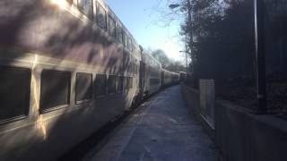 MBTA commuter train 522 draws into Wellesley Hills pulled by GP40 locomotive.