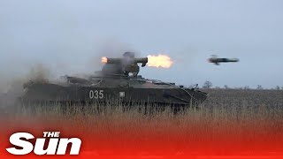 Mobilised Russian troops train using tanks and missile systems