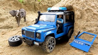 Rescue the police car stuck in the cave with excavator and crane truck - Toy car story