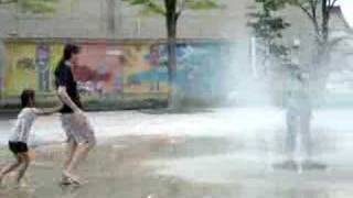 Xiaofeng and Valerie Playing in the Water-Fountain!