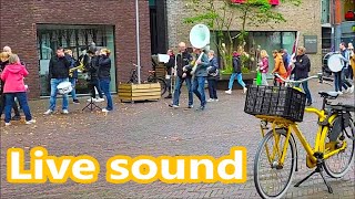 Con Brio Drum and Show Band. Live sound on Dutch street. Transition from theatre to church.