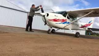 Starting a Cessna C172 by hand (hand prop)