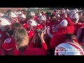 suny cortland football team celebrating its 2024 cortaca jug win over ithaca college