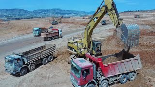 Caterpillar 365C Hydraulic Excavator Loading Mercedes And MAN 4 Axle Trucks - Aerial View