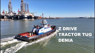 Z Drive Tractor Tug Denia Passing The USS Texas in Galveston