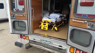 EMS stretcher unloading