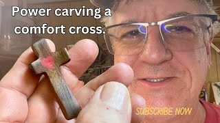 Carve a walnut comfort cross.