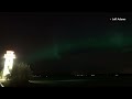 aurora lights up night sky in alberta canada