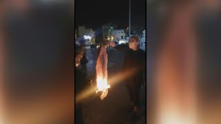 Woman burns headscarf amid Iran protest crackdown | AFP