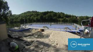 Installation of a floating swimming pool in a river