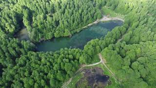 Alpine lake Moutsalia on Mount Grammos, Western Macedonia, Greece. Drone footage, Part 1, Bach.