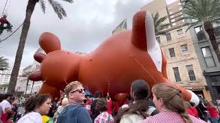 Rudolph the Red-Nosed Reindeer parade balloon does the limbo