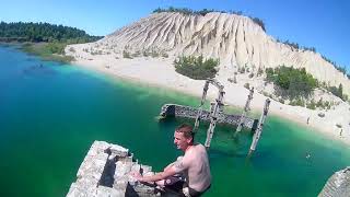 Jumping off a old Soviet Prison into rock Quarry Rummu Prison outside Tallin Estonia