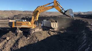 Liebherr 974 Excavator Loading Trucks With Three Passes