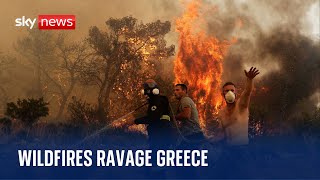 Heatwave: Thousands evacuate as wildfires tear through Greece