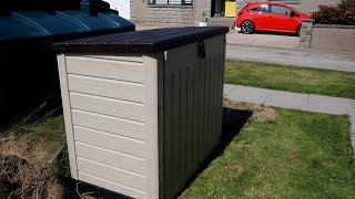 Assembling our new wheelie bin store, they keep getting blown away.